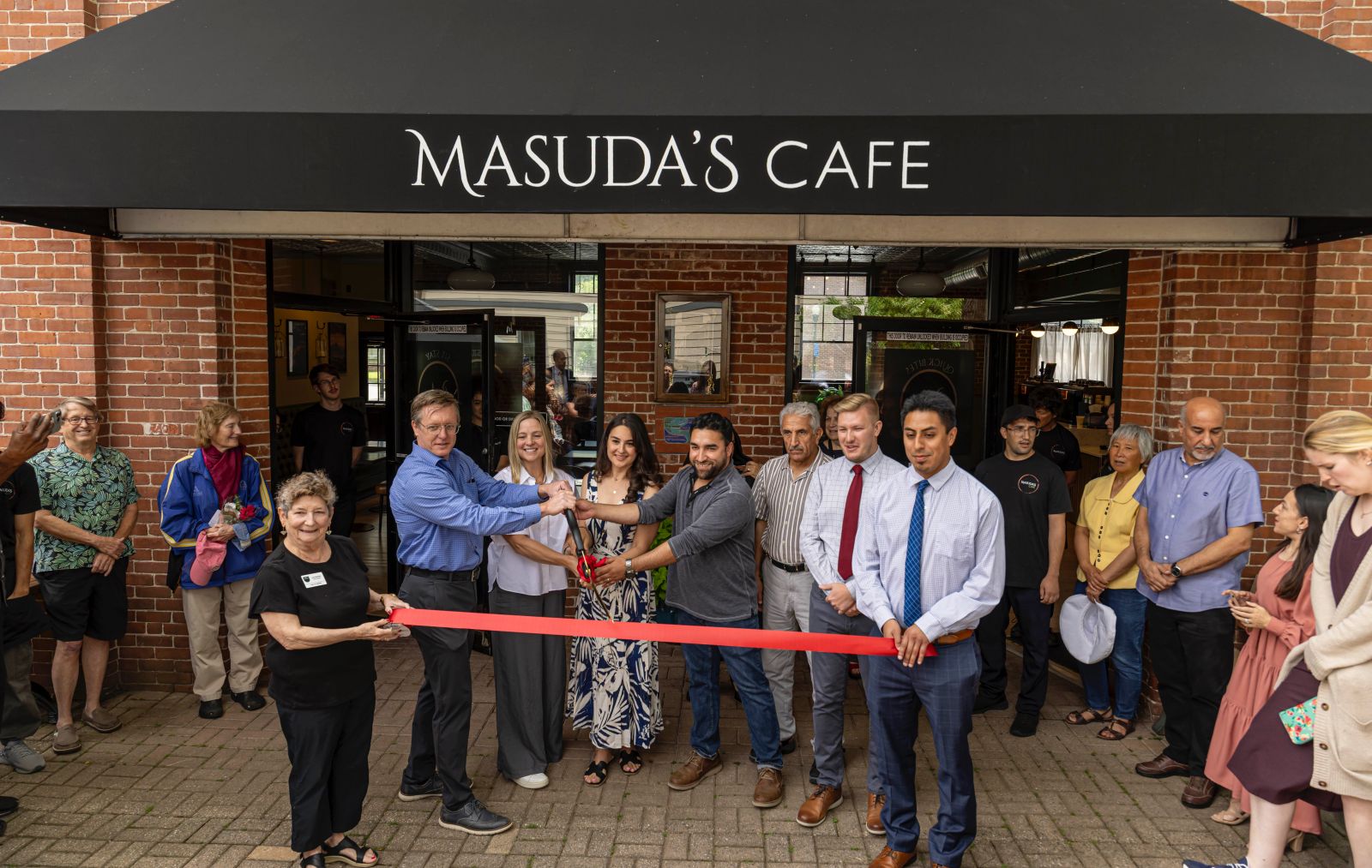 Masuda's Café Grand opening and ribbon cutting