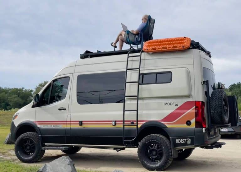 Pause for work on top of a VanSolo 2023 Storyteller Overland Beast Mode 4x4 Mercedes Sprinter.